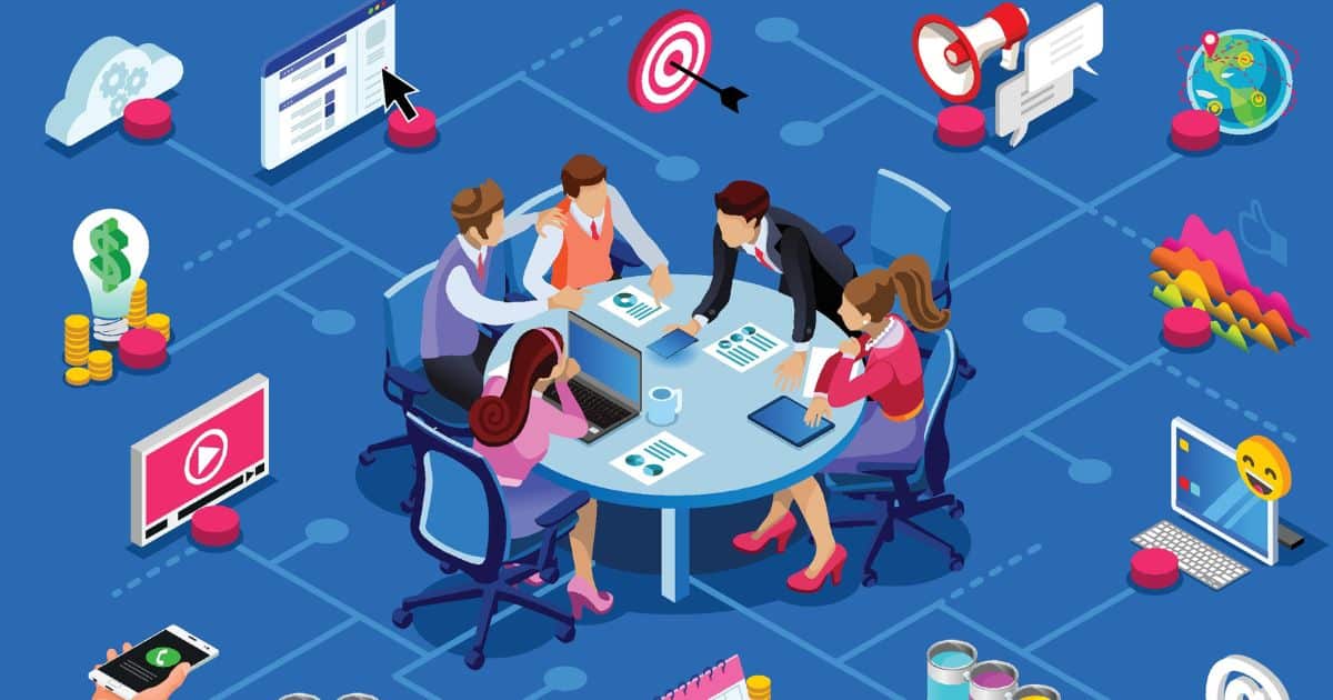 Illustration of five people in business attire working at a round table with laptops and documents, surrounded by digital marketing and business icons on a blue background—ideal for showcasing a senior living marketing agency in action.