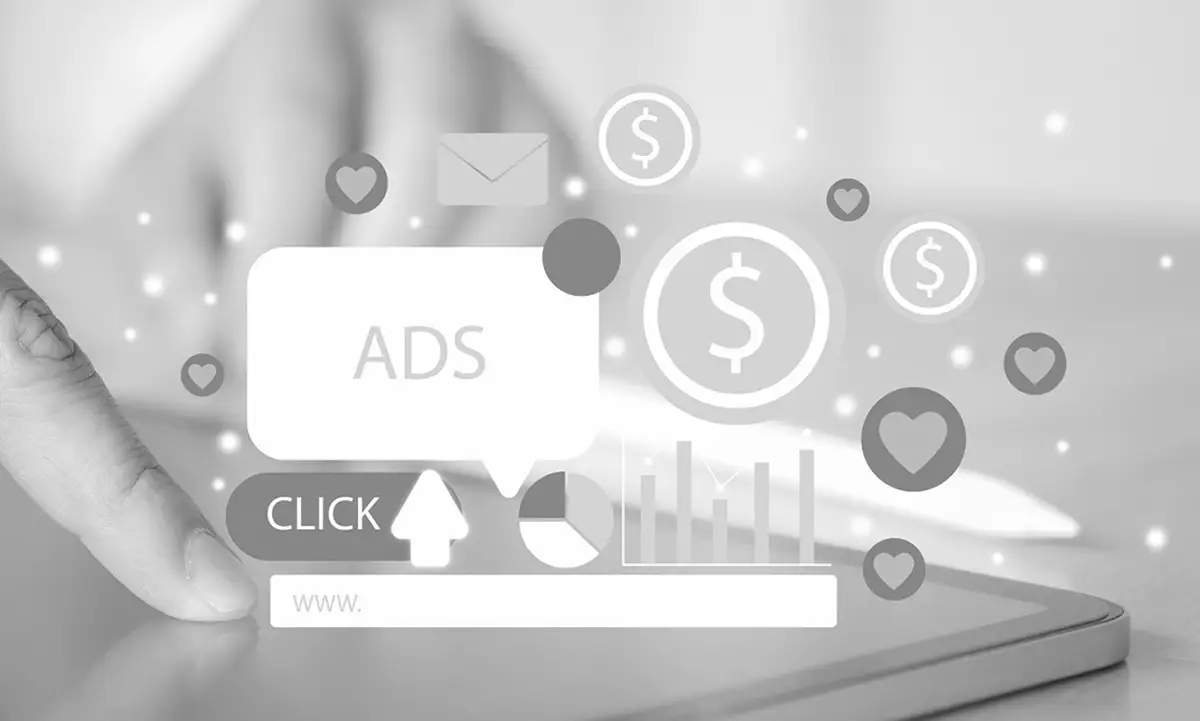 A hand touches a tablet screen with digital icons representing ads, money, charts, likes, and a search bar overlayed.