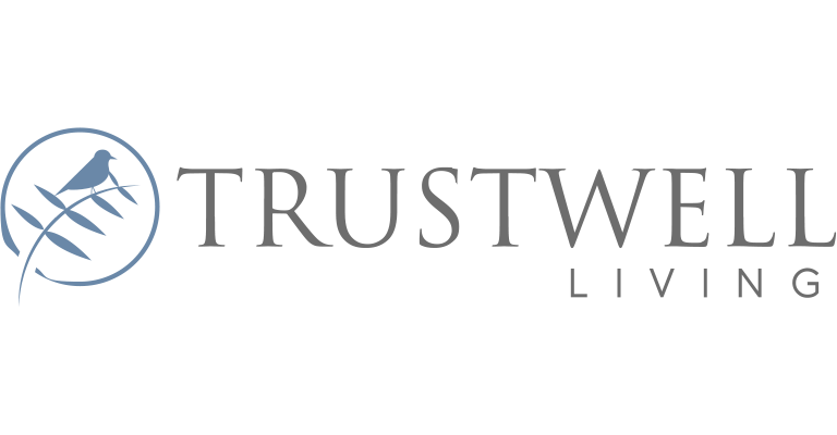 Trustwell Living logo with a blue bird perched on a branch inside a circle, and the words "Trustwell Living" in grey text to the right.
